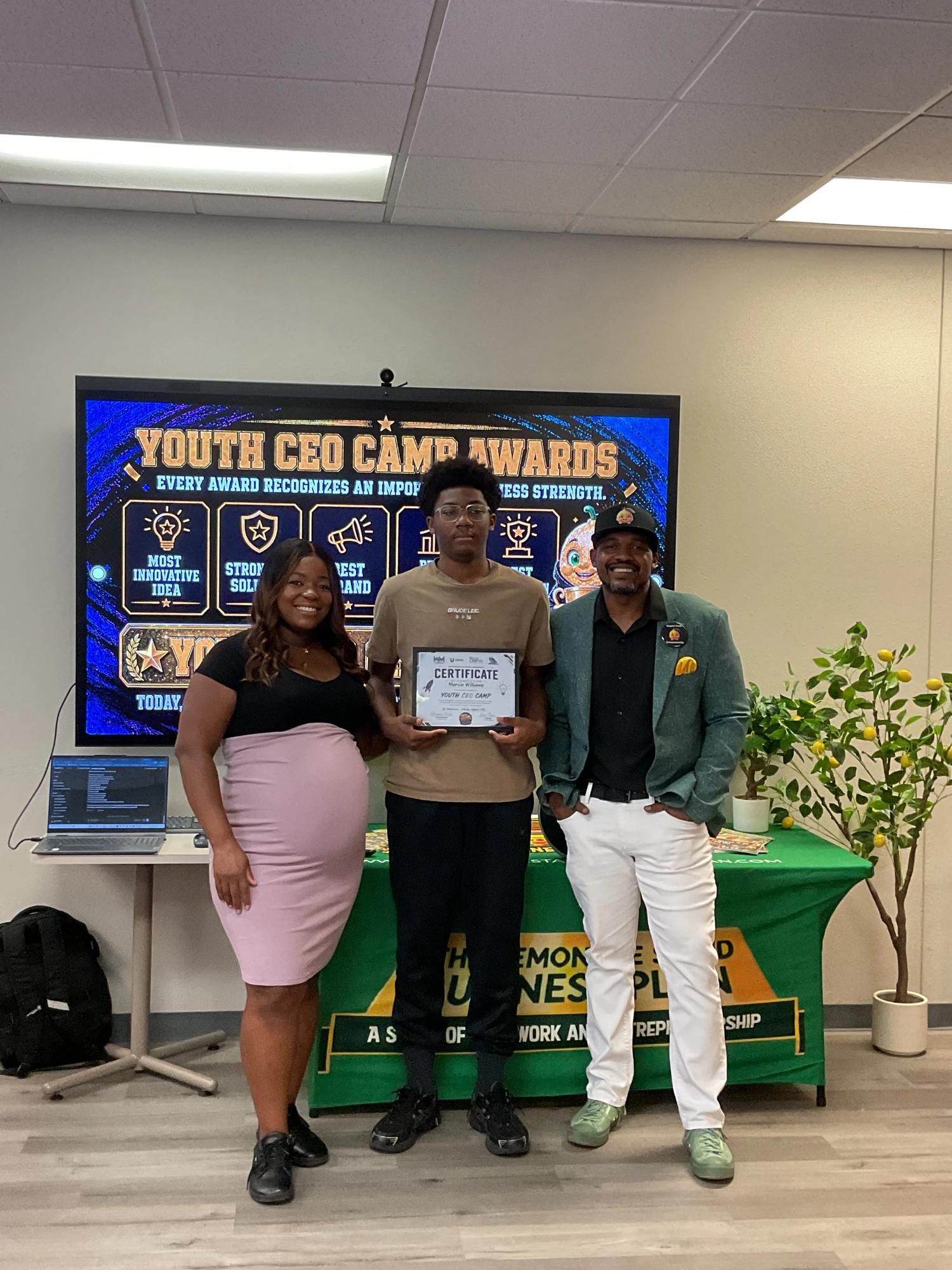 Bishop Ward, the youngest Young CEO, receiving his certificate